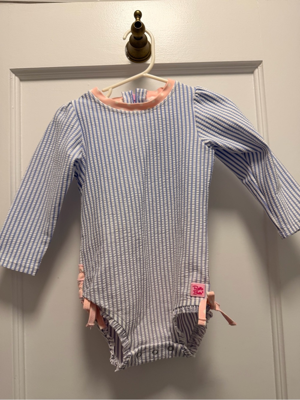 Ruffle Butts Blue Stripe One-Piece with Pink Trim